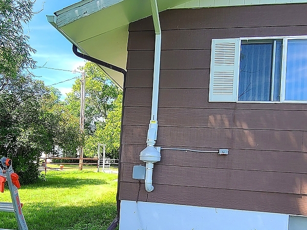 Certified Radon Specialists inspection of home exterior